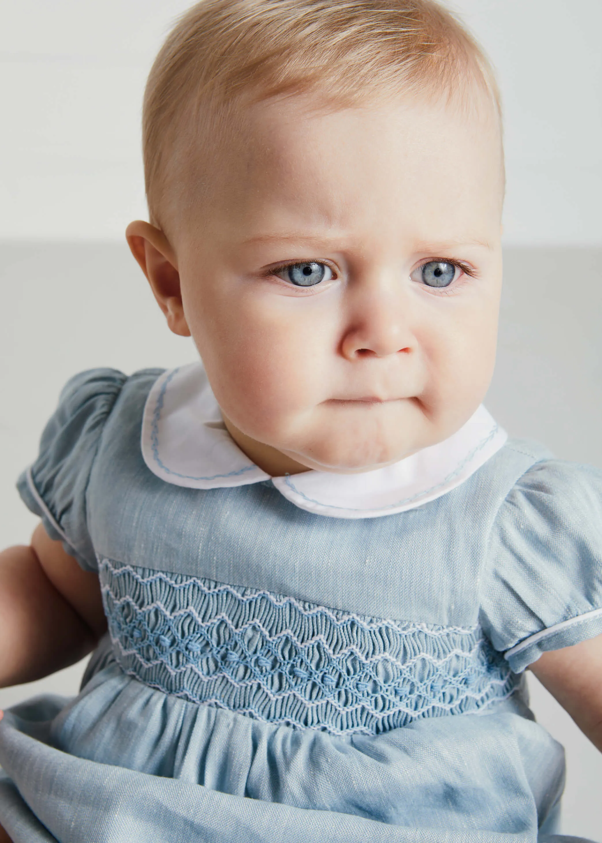 Hand Smocked Peter Pan Collar Short Sleeve Romper in Blue (3-18mths)